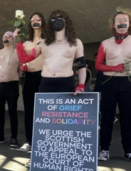 Men get their moobs out in protest at the Supreme Court ruling at the Scottish Parliament.