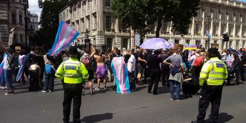 Sarah Jane Baker leads topless protest in London, and threatens named women
