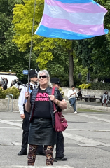 Sarah Jane Baker leads topless protest in London, and threatens named women