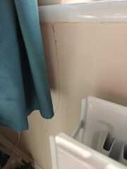 Crack below two windows