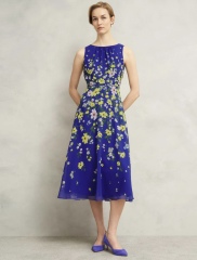 Wedding guest dress - splash out on silk or stick to budget?