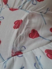 Could a seamstress/tailor fix this? Damaged dress :-(