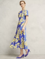 Wedding guest dress - splash out on silk or stick to budget?