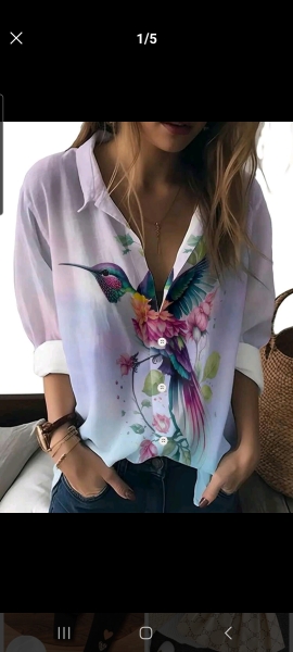 Can anyone id a blouse? White with neon birds