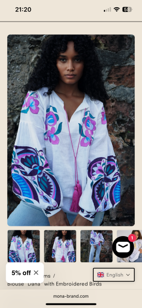 Can anyone id a blouse? White with neon birds