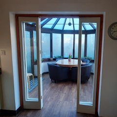 To not install doors between house and conservatory