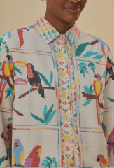 Can anyone id a blouse? White with neon birds