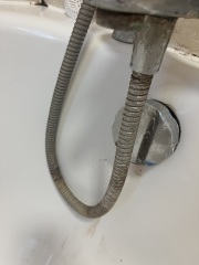 How to clean yellow stuff around tap