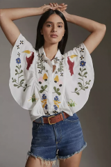 Can anyone id a blouse? White with neon birds