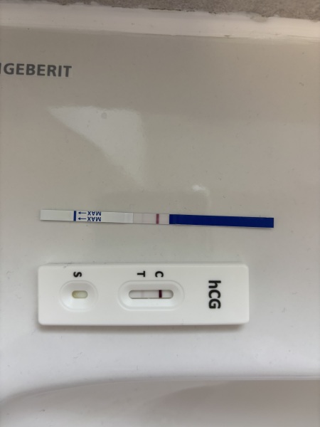 Very faint positive 13 days po