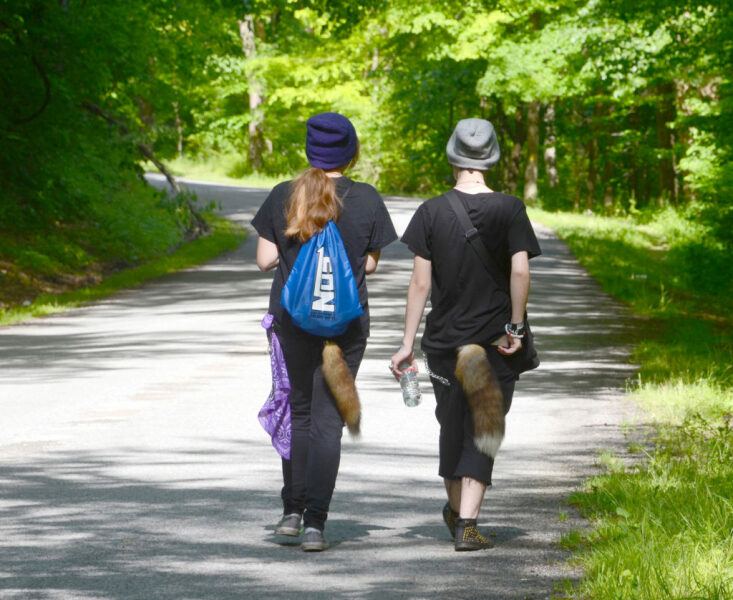 Girls Using Walking Sticks