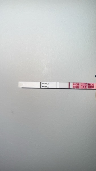 Am I seeing things? Is this pos or neg? 9dpo