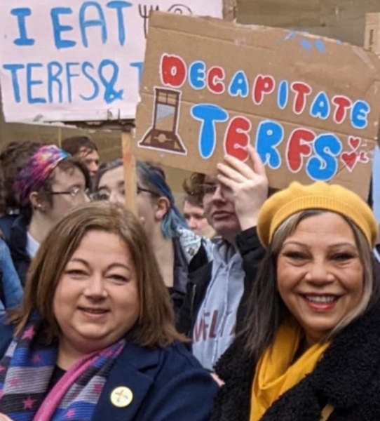 arrested at Pride for wearing a sign saying Trans=mental illness