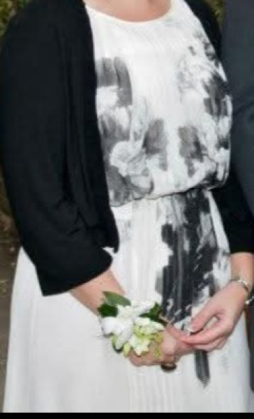 Is this dress too white for a wedding guest?