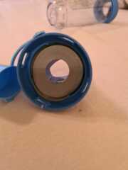 Help needed putting asthma spacer back together