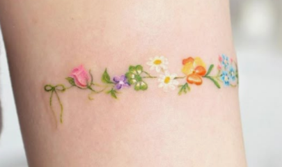 Does anyone actually have a tattoo like this? (Tiny, colourful realism)