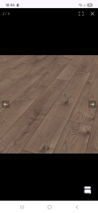 What colour ro paint my living room to go with dark green?