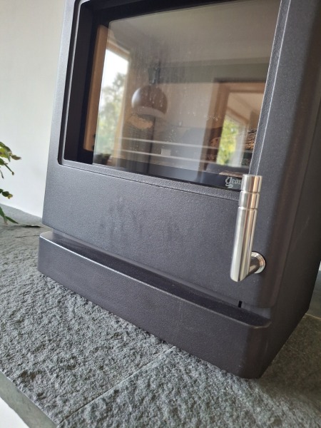 Fingerprints on black stove