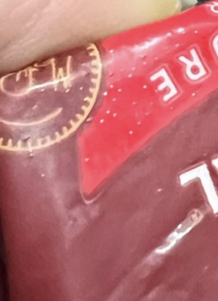 Little indents on cathedral cheese packaging