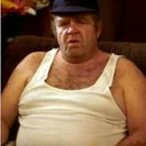 Is it acceptable for husband to wear white M&S vest in public???