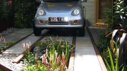 Cost of turning front garden into driveway?