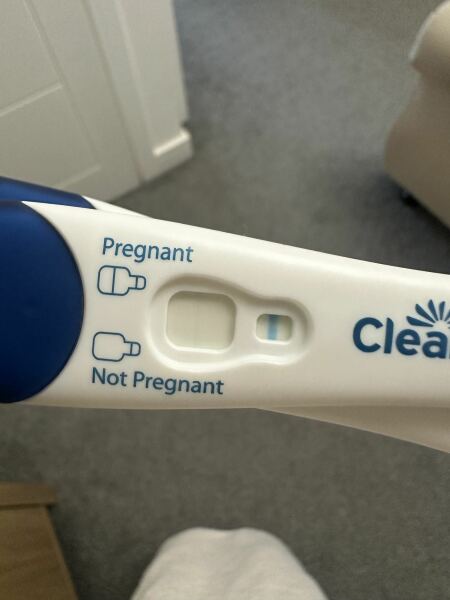 Smiley Positive Ovulation Test AND Faint Positive Pregnancy Test?!