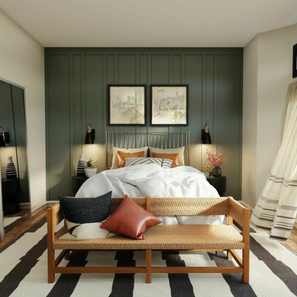 Wall lamp above bed and wall art