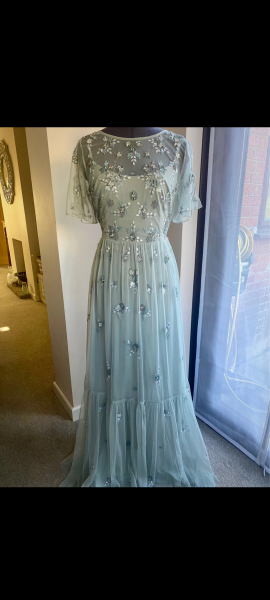 Is this dress too pale for a black tie wedding?