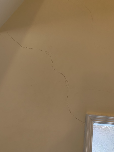 Cracks around window and doors. Massive anxiety.