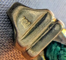 Hallmark on gold bracelet