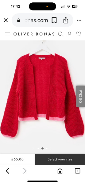 Help finding a cardigan to go with everything on holiday.