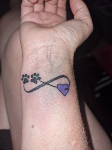 To get a paw print tattoo?