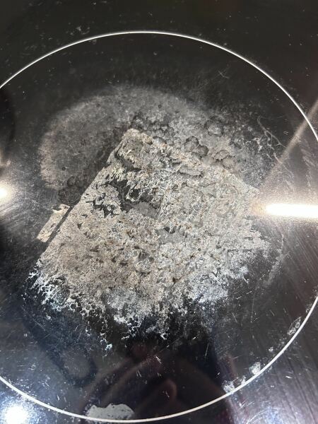 Plastic melted on glass hob - help!