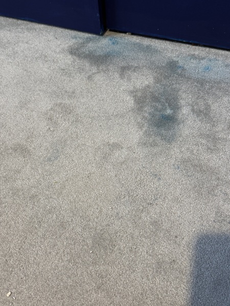 Not paying painter due to carpet stains?
