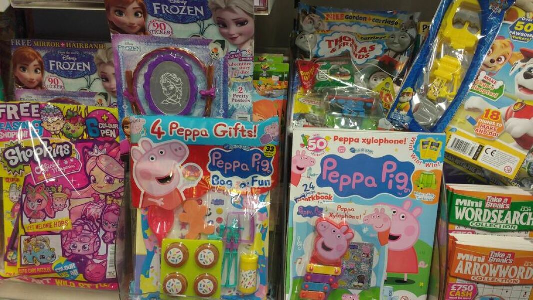 Plastic toys on magazines...