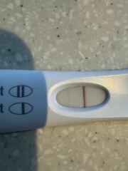 IVF 6dp5dt - possibly positive (or trigger?)