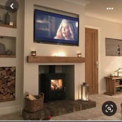 Log burner with sunken tv above...heat damage