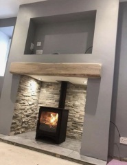 Log burner with sunken tv above...heat damage