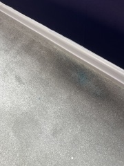 Not paying painter due to carpet stains?