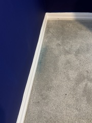 Not paying painter due to carpet stains?
