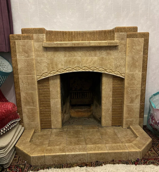 What colour would you paint this dated fireplace?