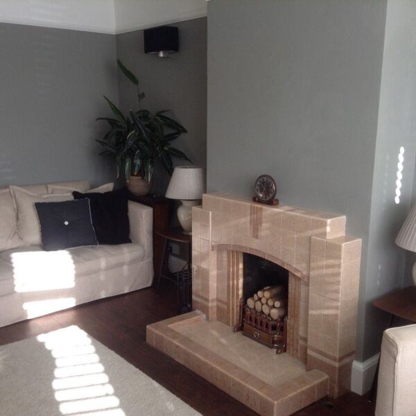 What colour would you paint this dated fireplace?