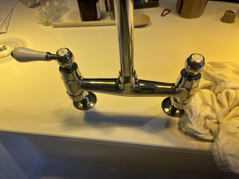 How do I get into this mixer tap?