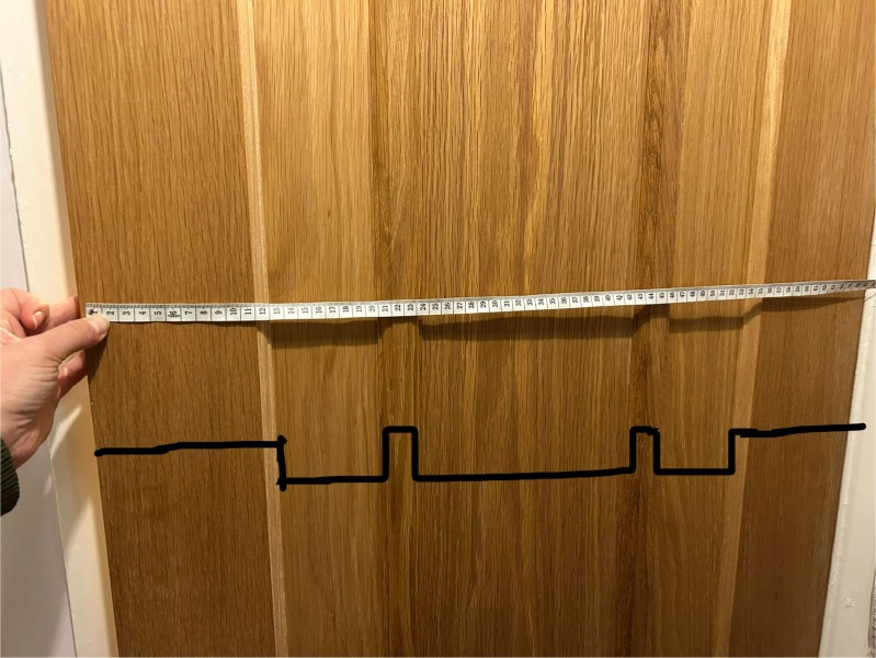 How can I hang a mirror on this door?