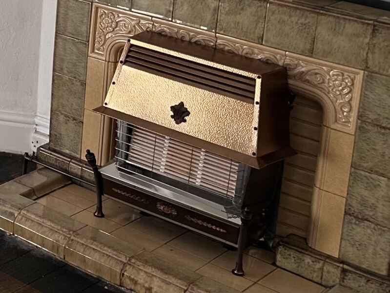 What colour would you paint this dated fireplace?