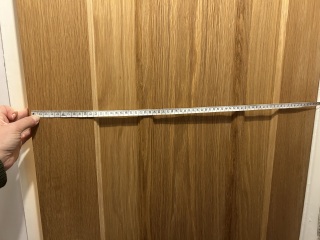 How can I hang a mirror on this door?