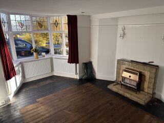 What colour would you paint this dated fireplace?