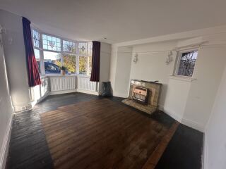 What colour would you paint this dated fireplace?