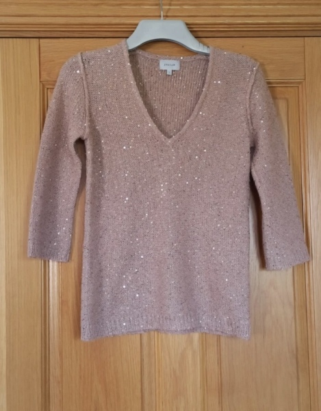 Can anyone find me a v neck sparkly top that has a good fit to wear with jeans for a night out?