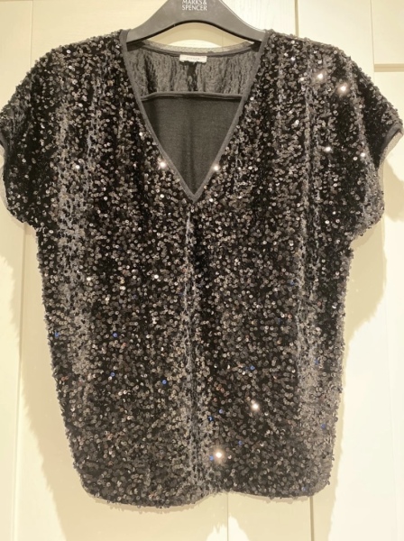 Can anyone find me a v neck sparkly top that has a good fit to wear with jeans for a night out?
